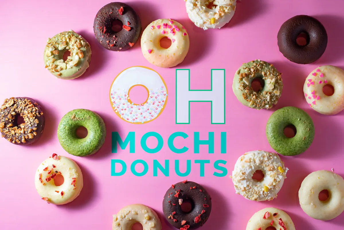 a group of different colored doughnut