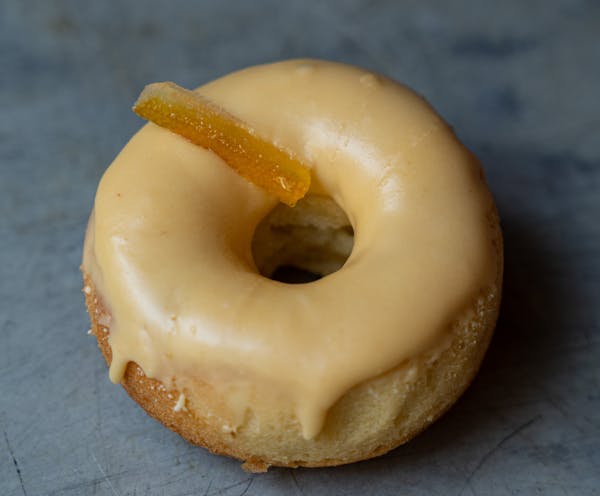 a doughnut sitting next to a donut