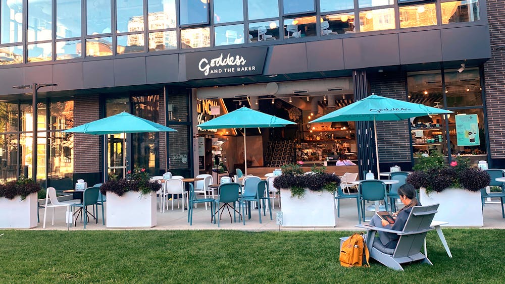 a couple of lawn chairs sitting on top of a table
