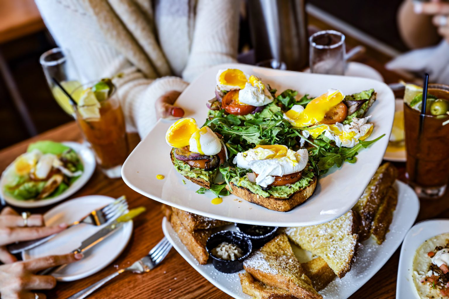 avocado toast at mission on the bayon a plate