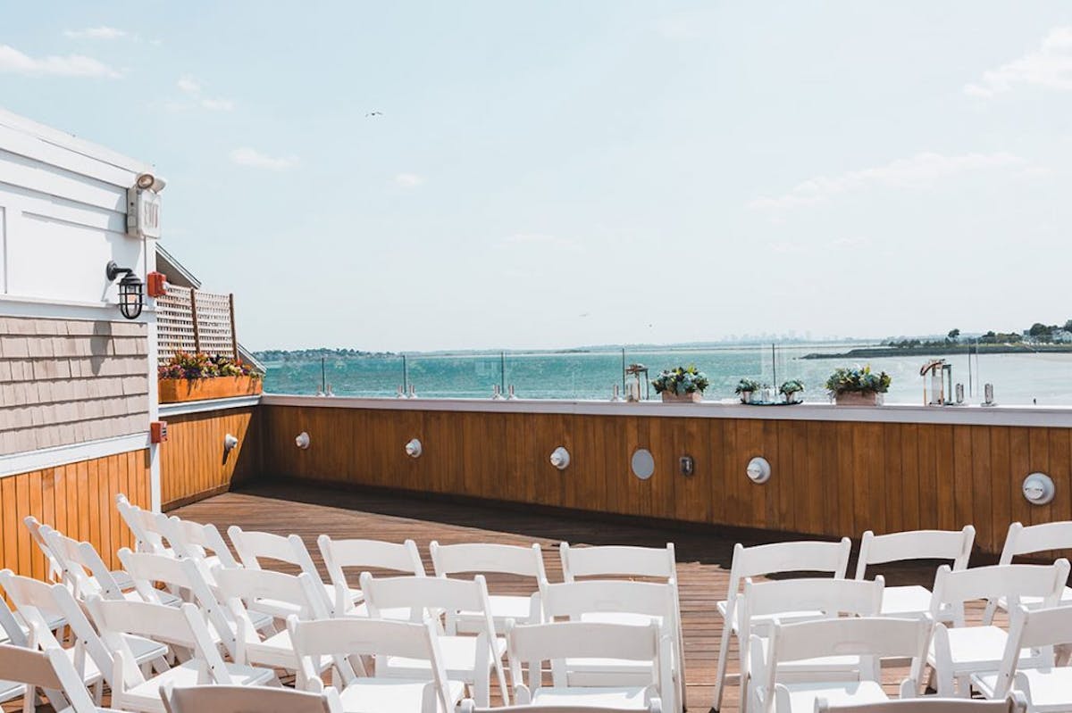 a wooden dock in front of a building