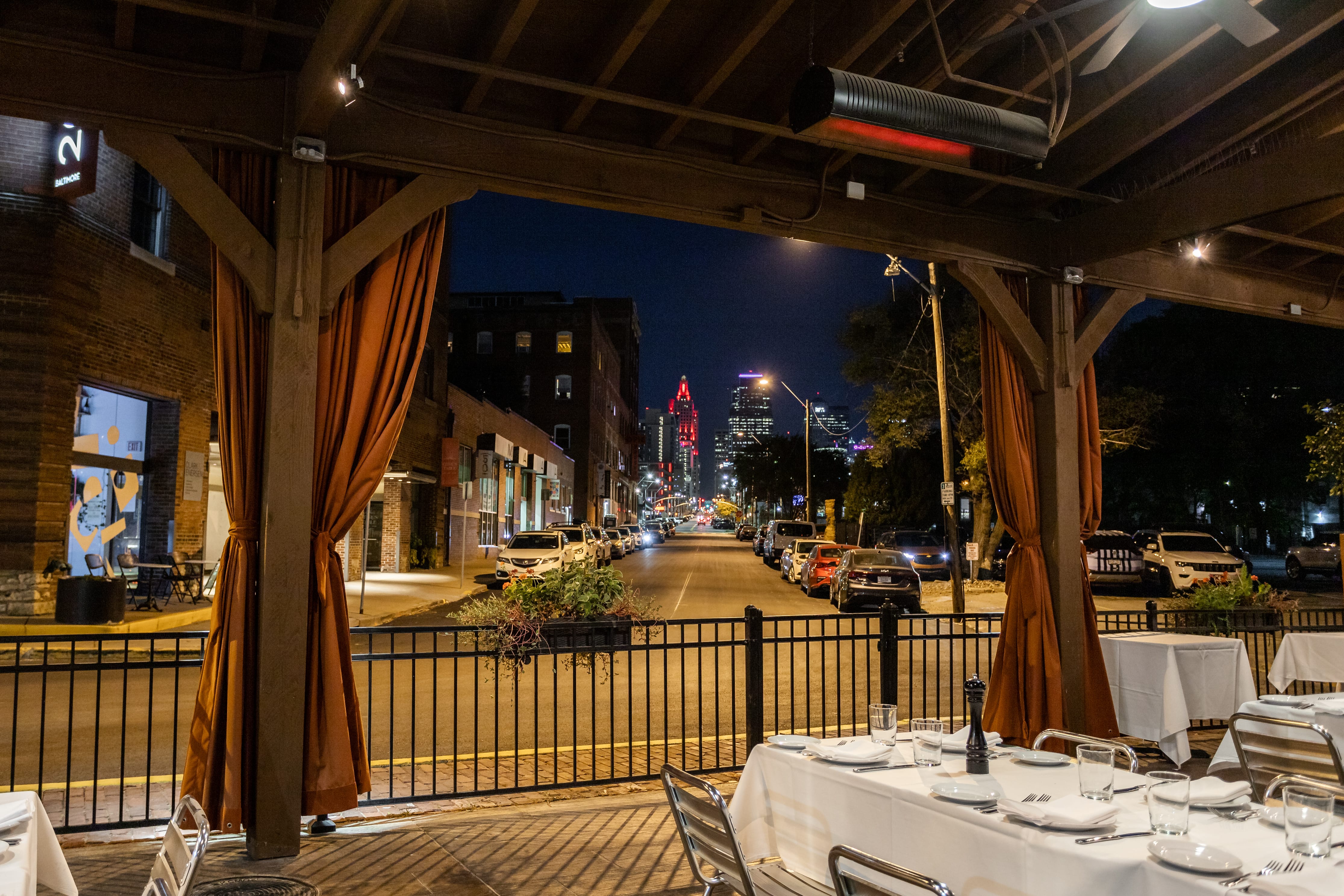 a dining room table in front of a building