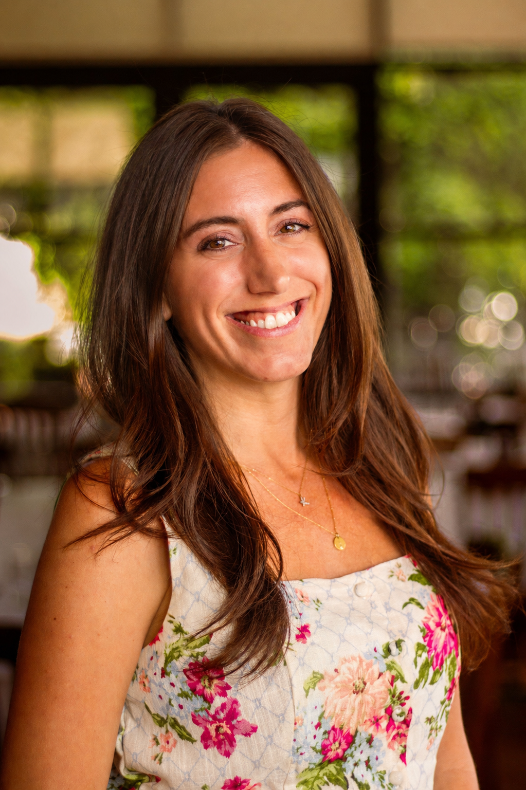 a woman smiling at camera
