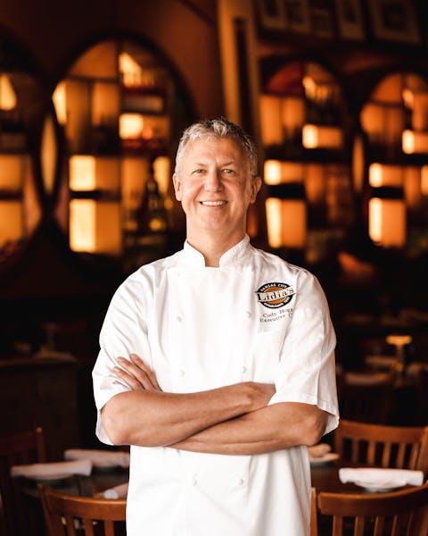 Cody Hogan standing in front of a restaurant