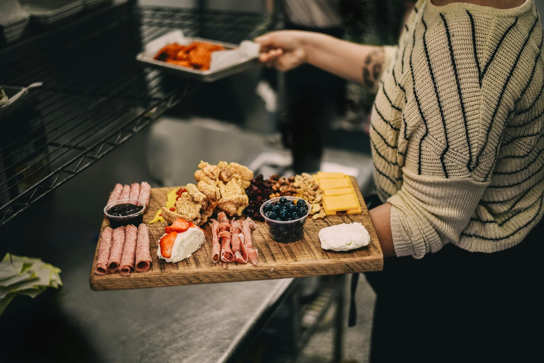 a cheese and ham wooden board
