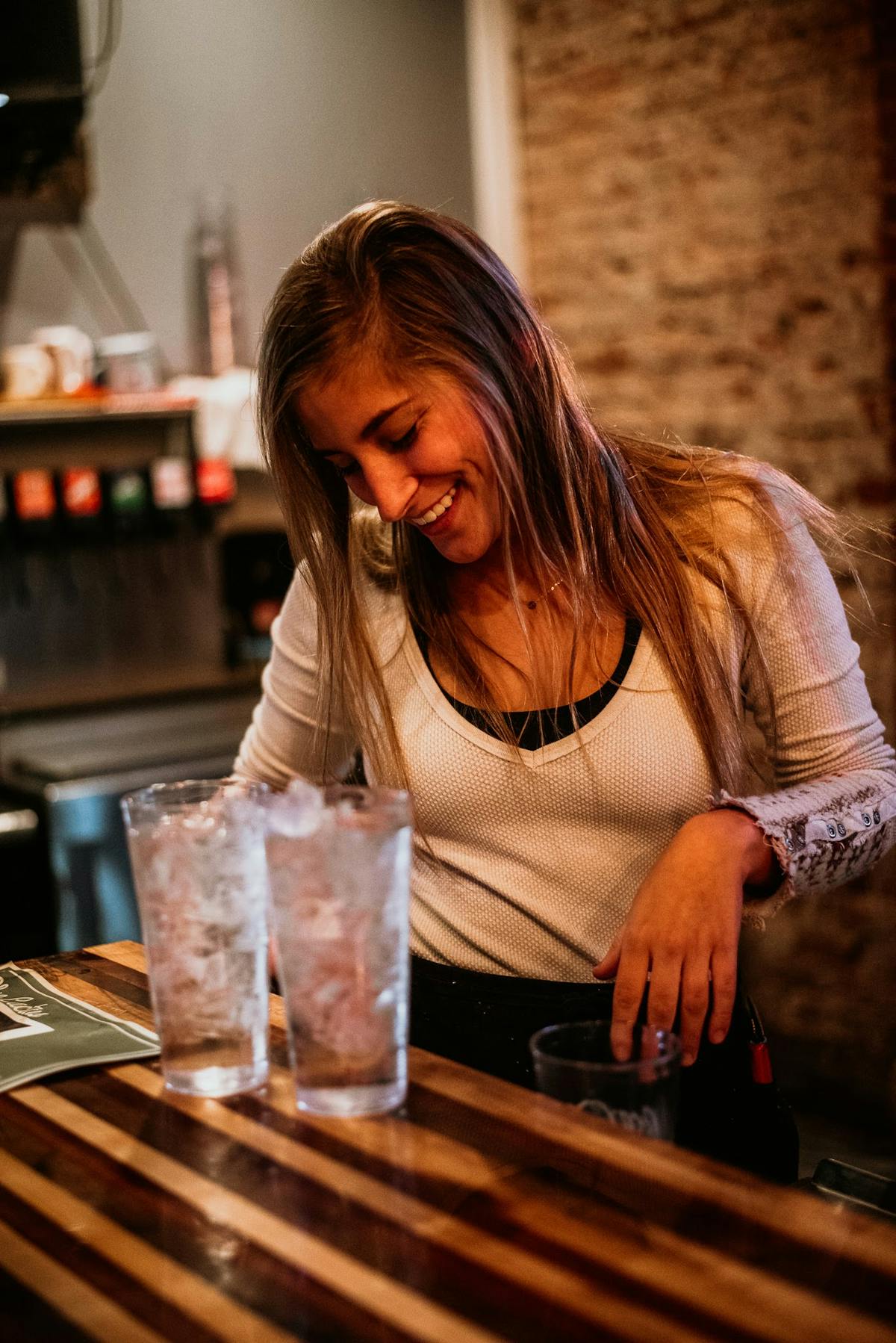 a woman sitting and smiling