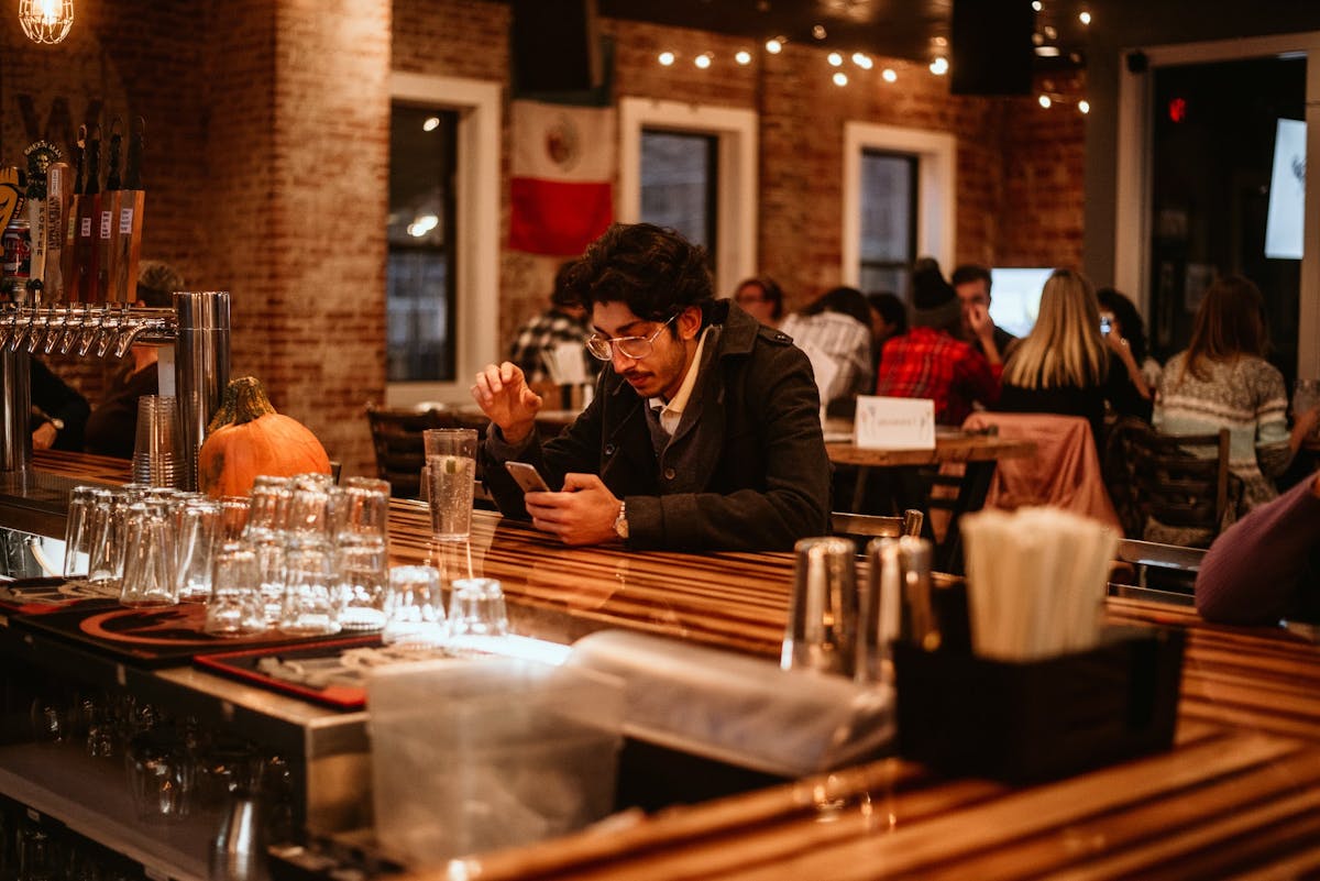 a man sitting at the bar