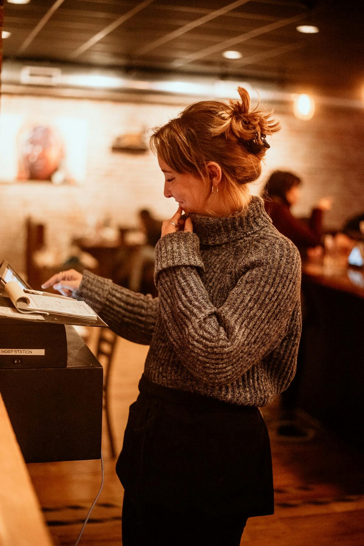 a waitress standing