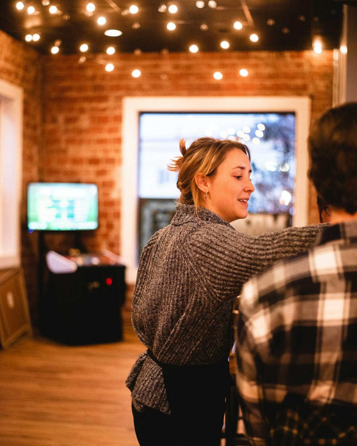 a man and a woman standing in a room