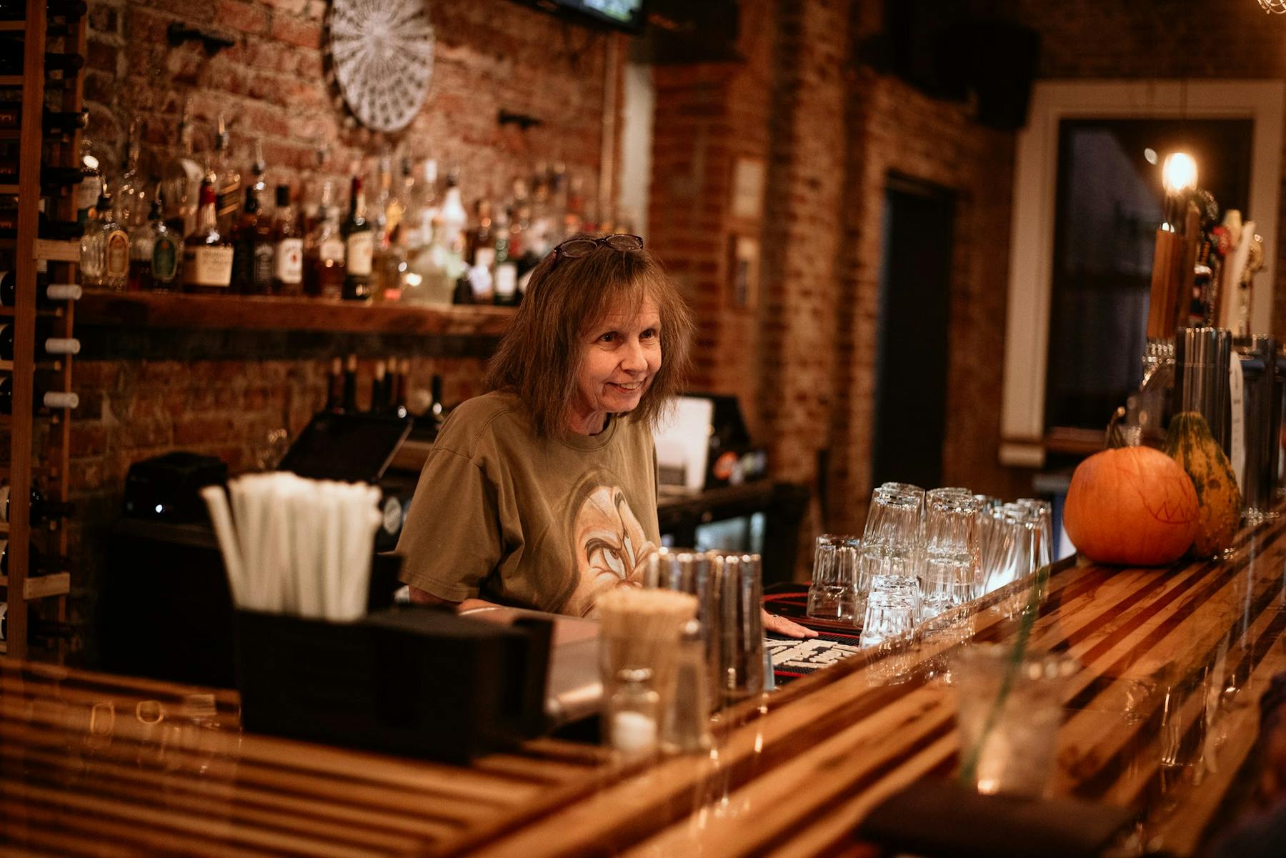 a person sitting at a table in a restaurant