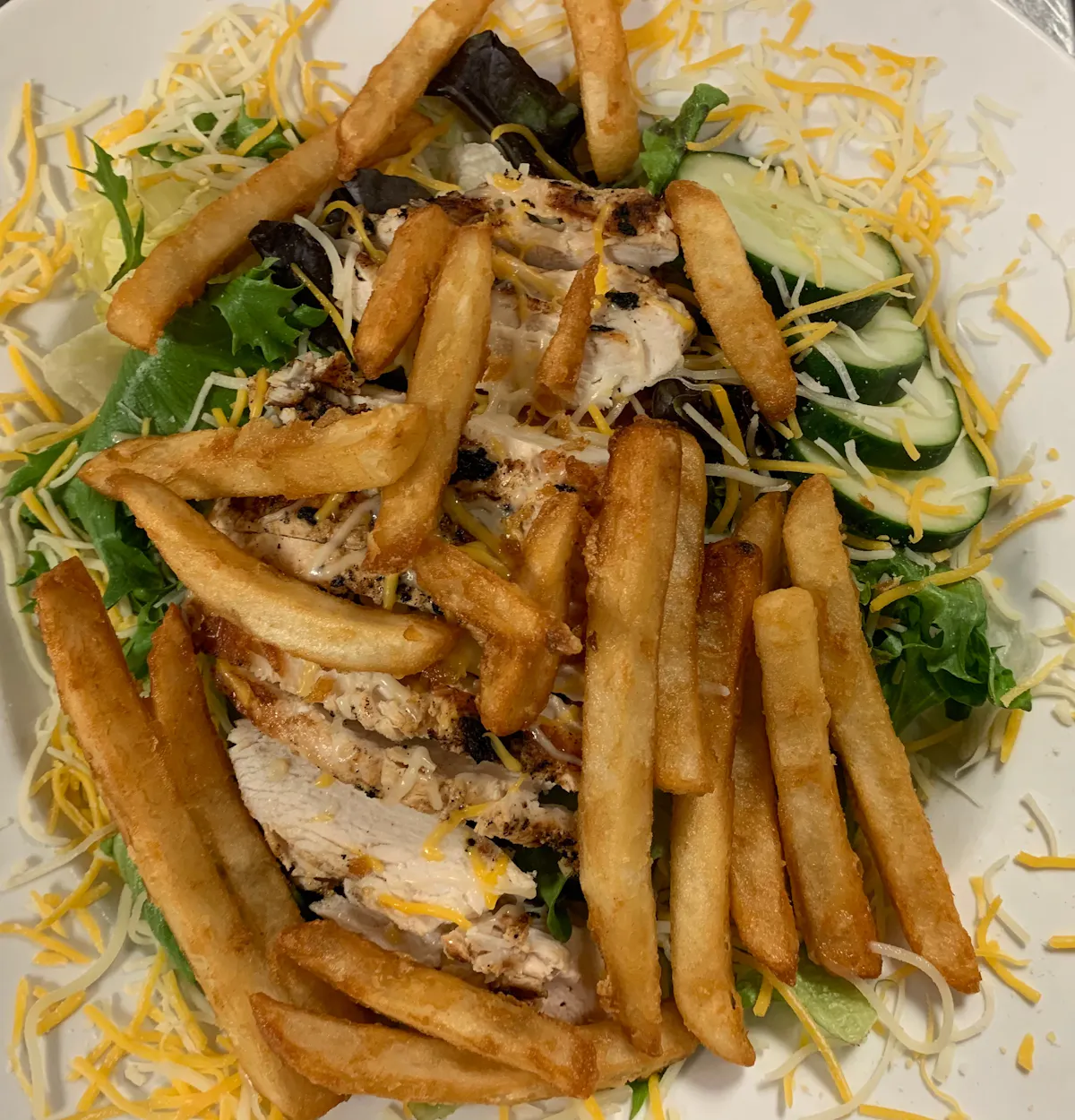 a sandwich and fries on a plate
