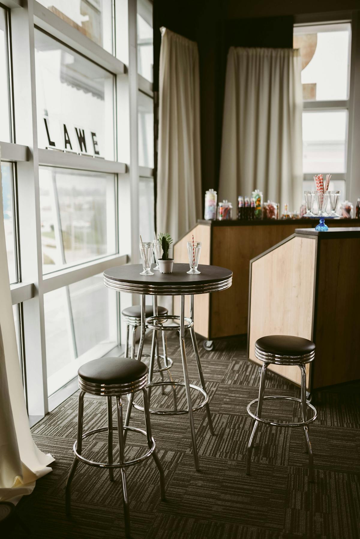 a chair sitting in front of a window