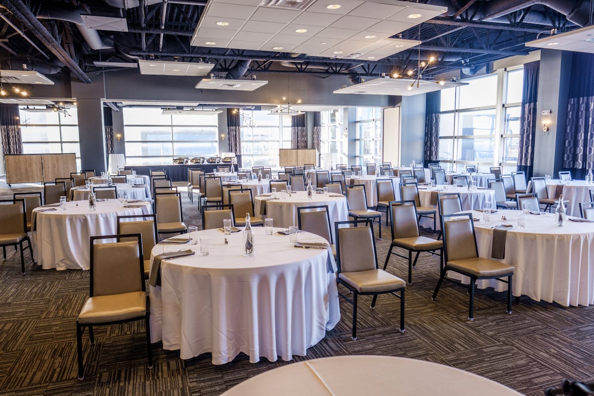 a large room with tables and chairs