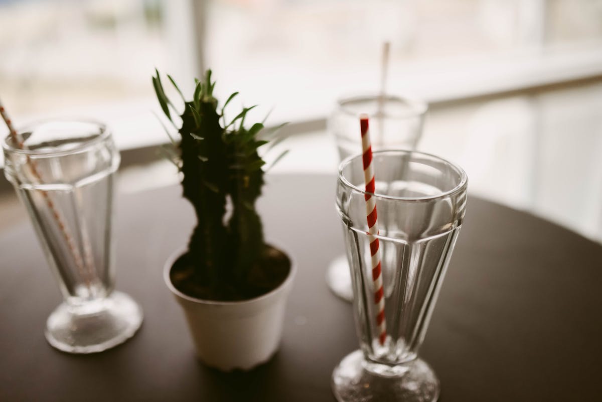 a close up of a glass vase on a table