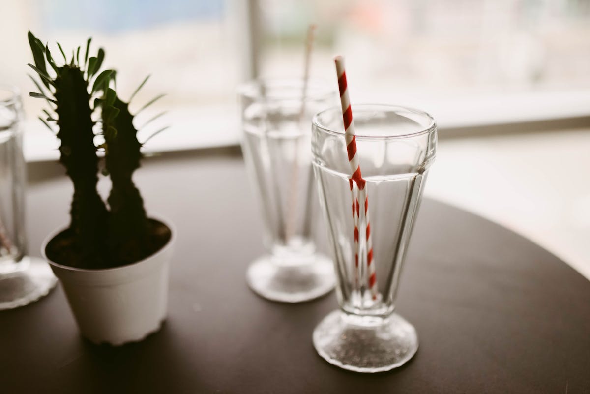 a close up of a glass vase on a table