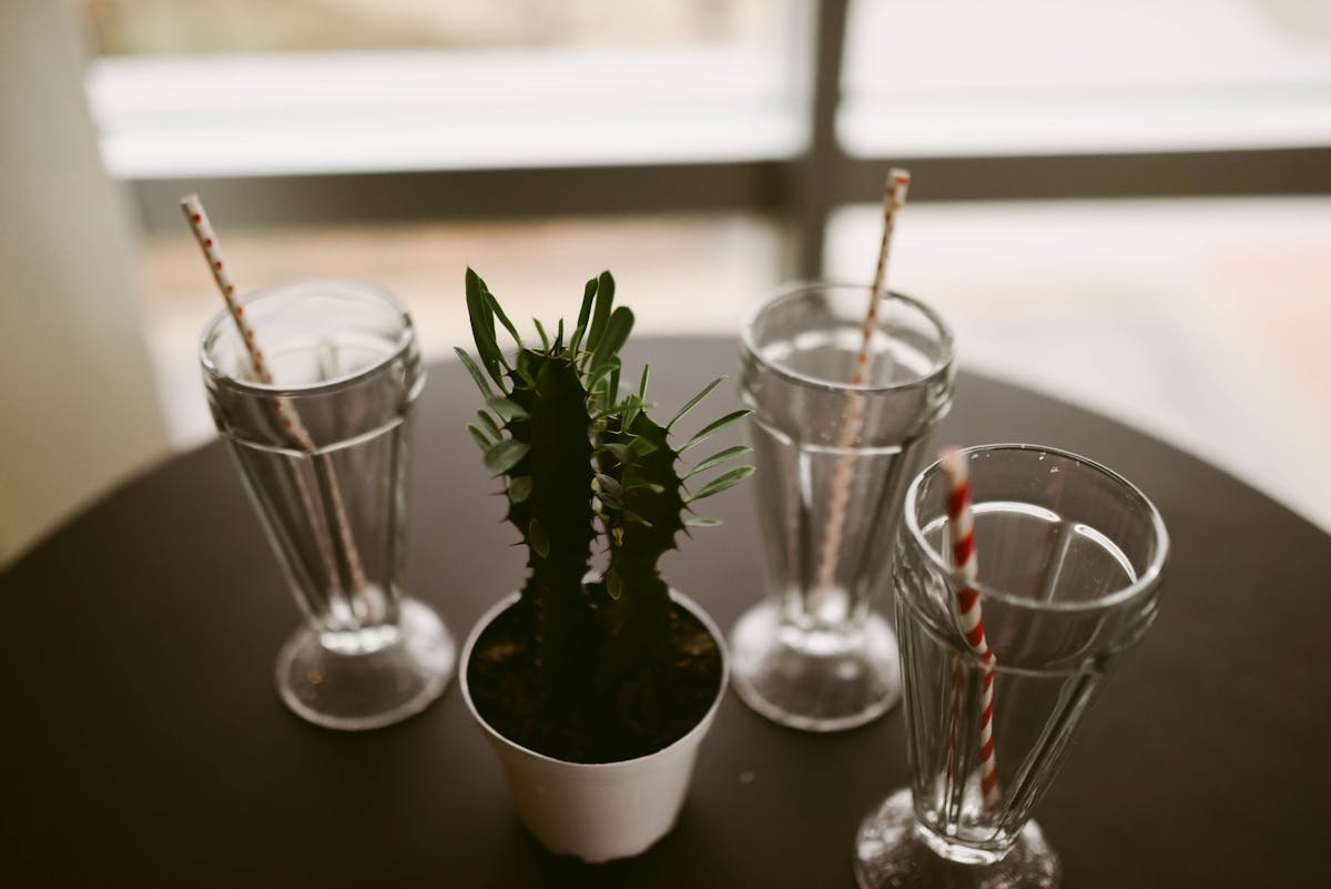 a close up of a glass vase on a table