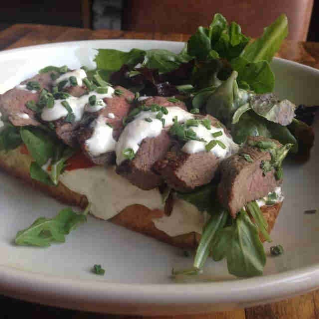 a sandwich and salad on a plate