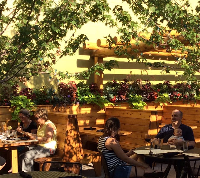 a group of people sitting at a table
