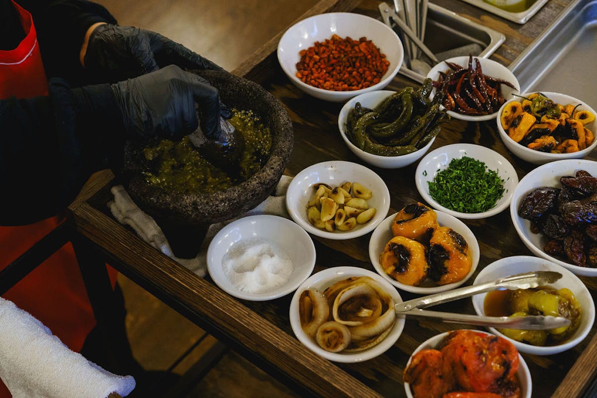 a bowl filled with different types of food on a table