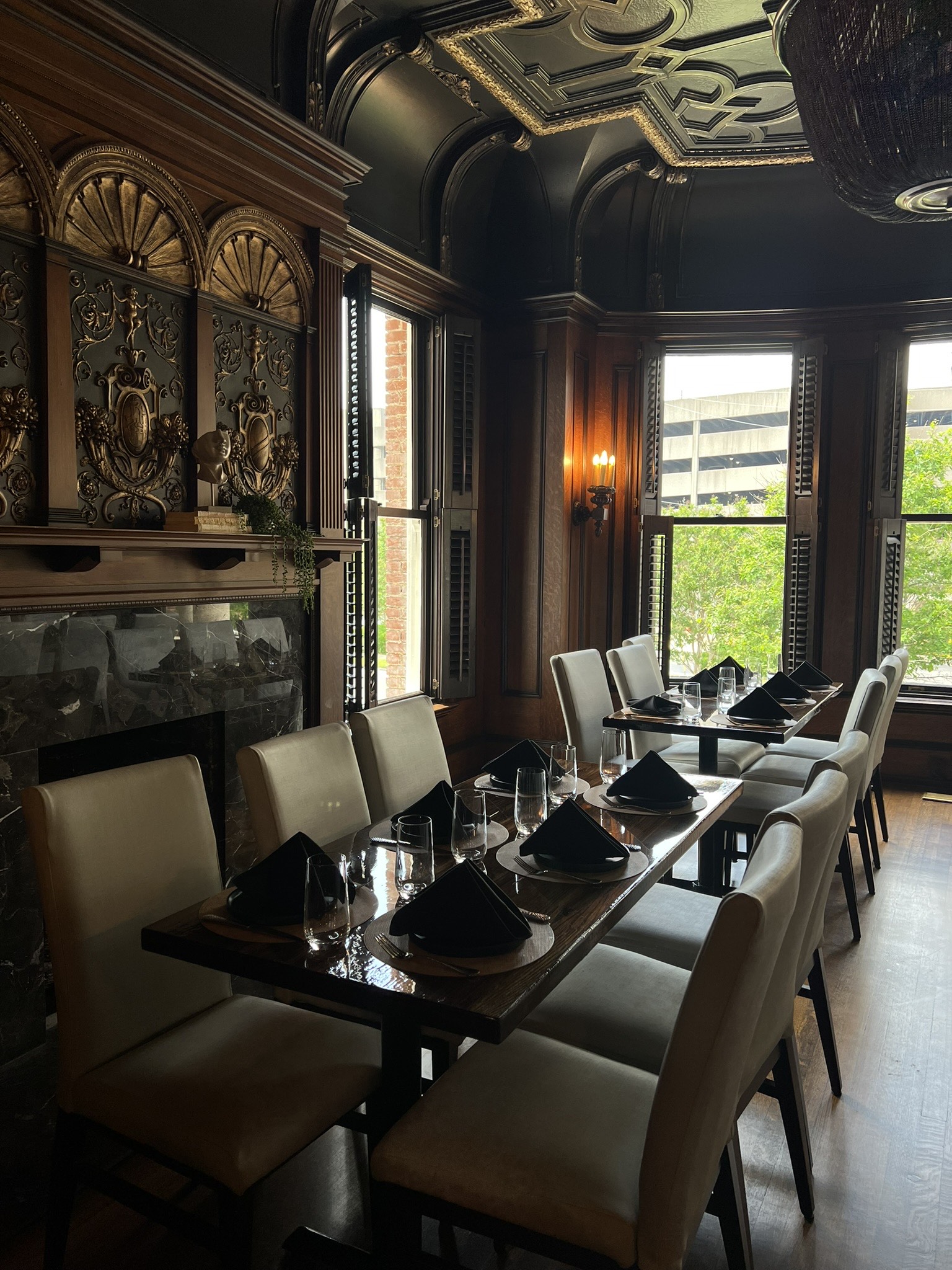 a living room filled with furniture and a large window