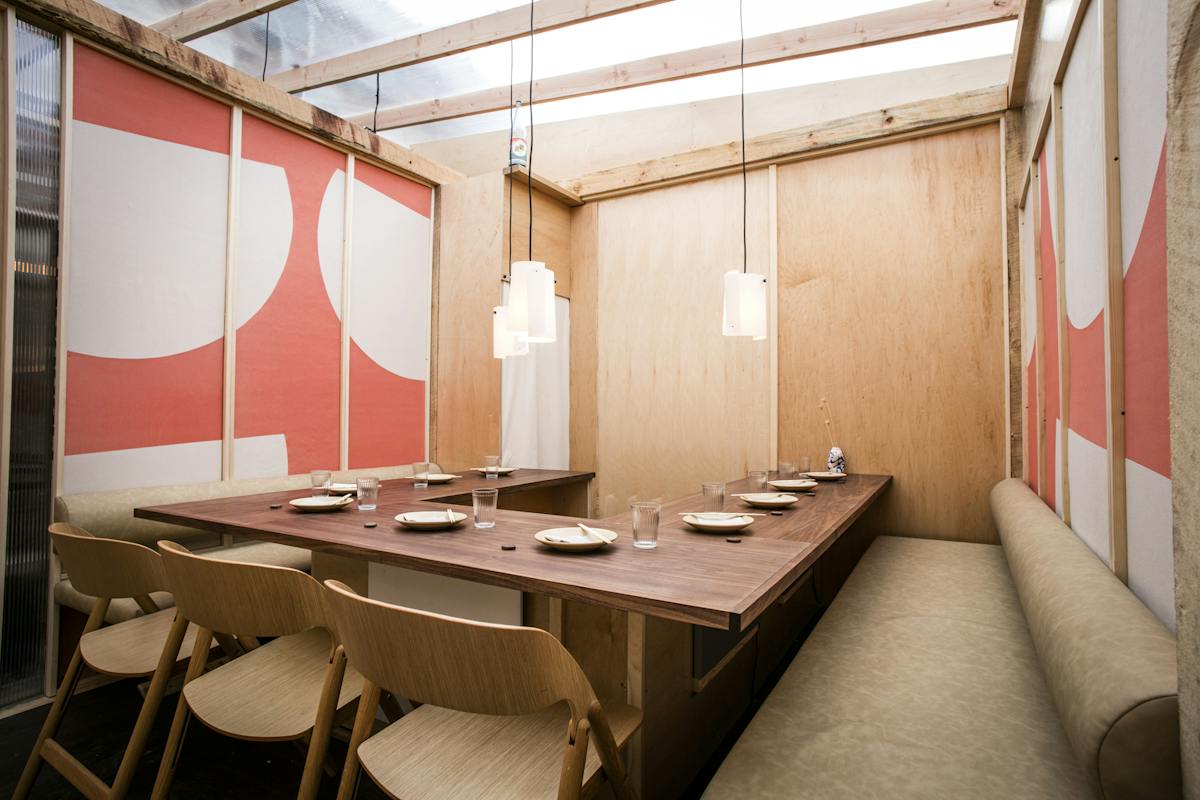 a room with a sink and a mirror