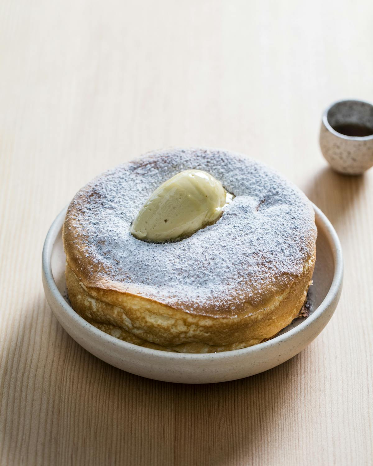 bowl of pancakes on table