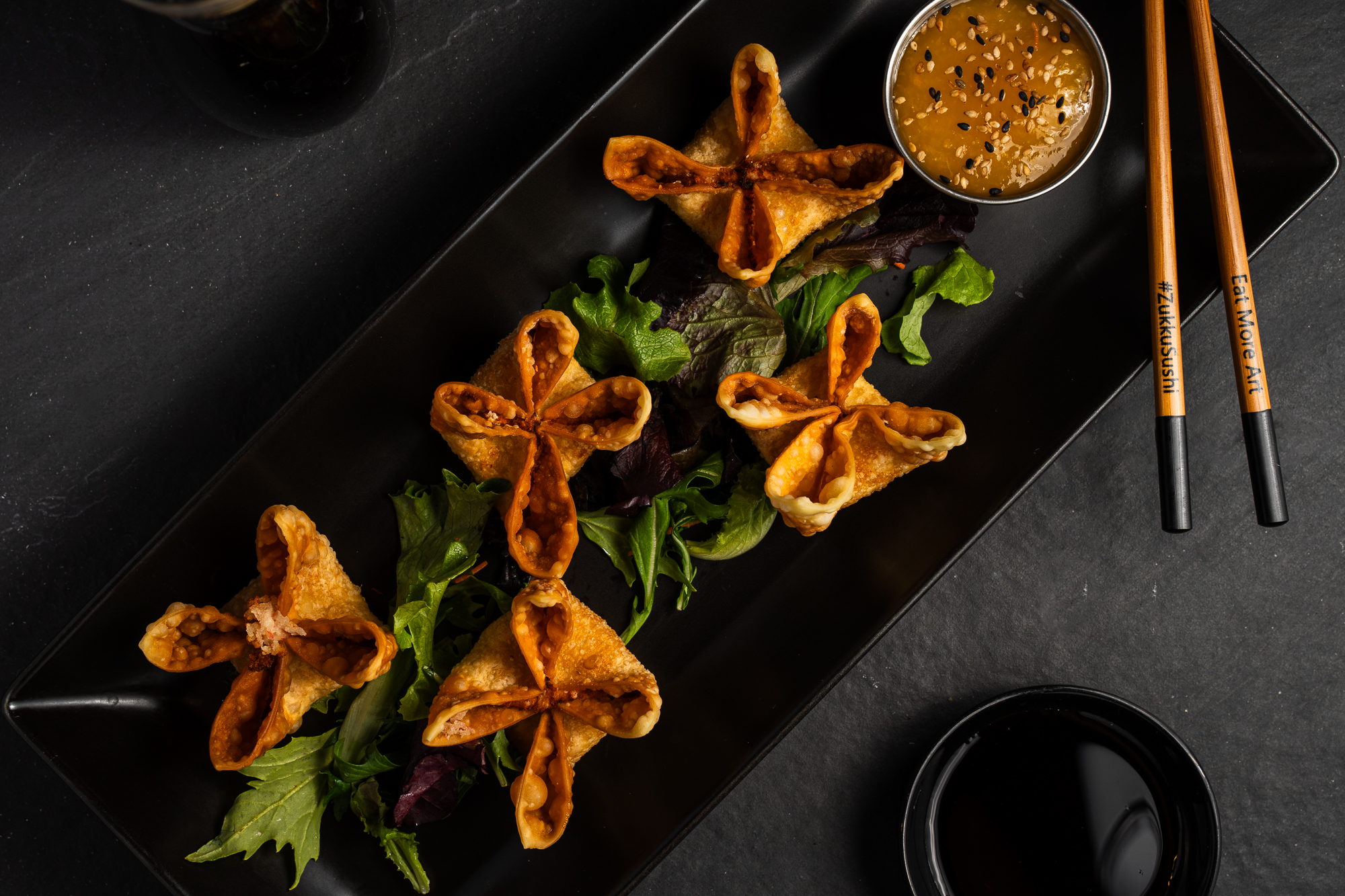 a plate of food with sauces