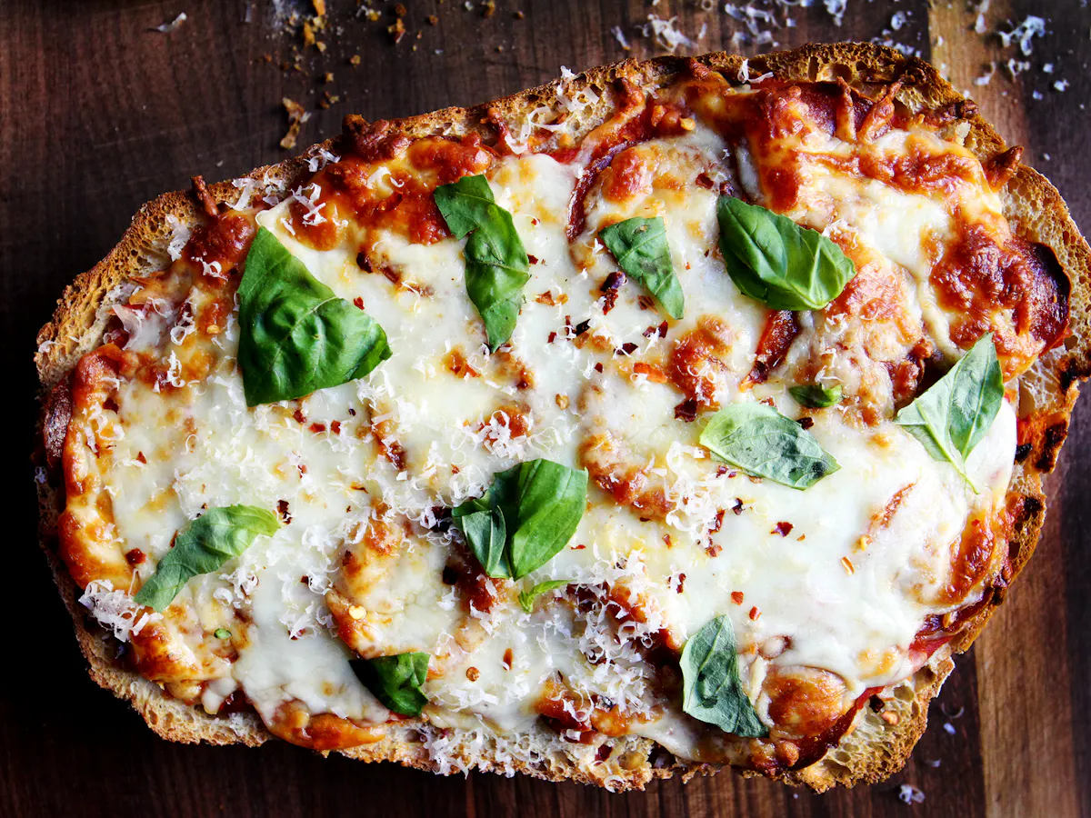 a close up of a slice of pizza