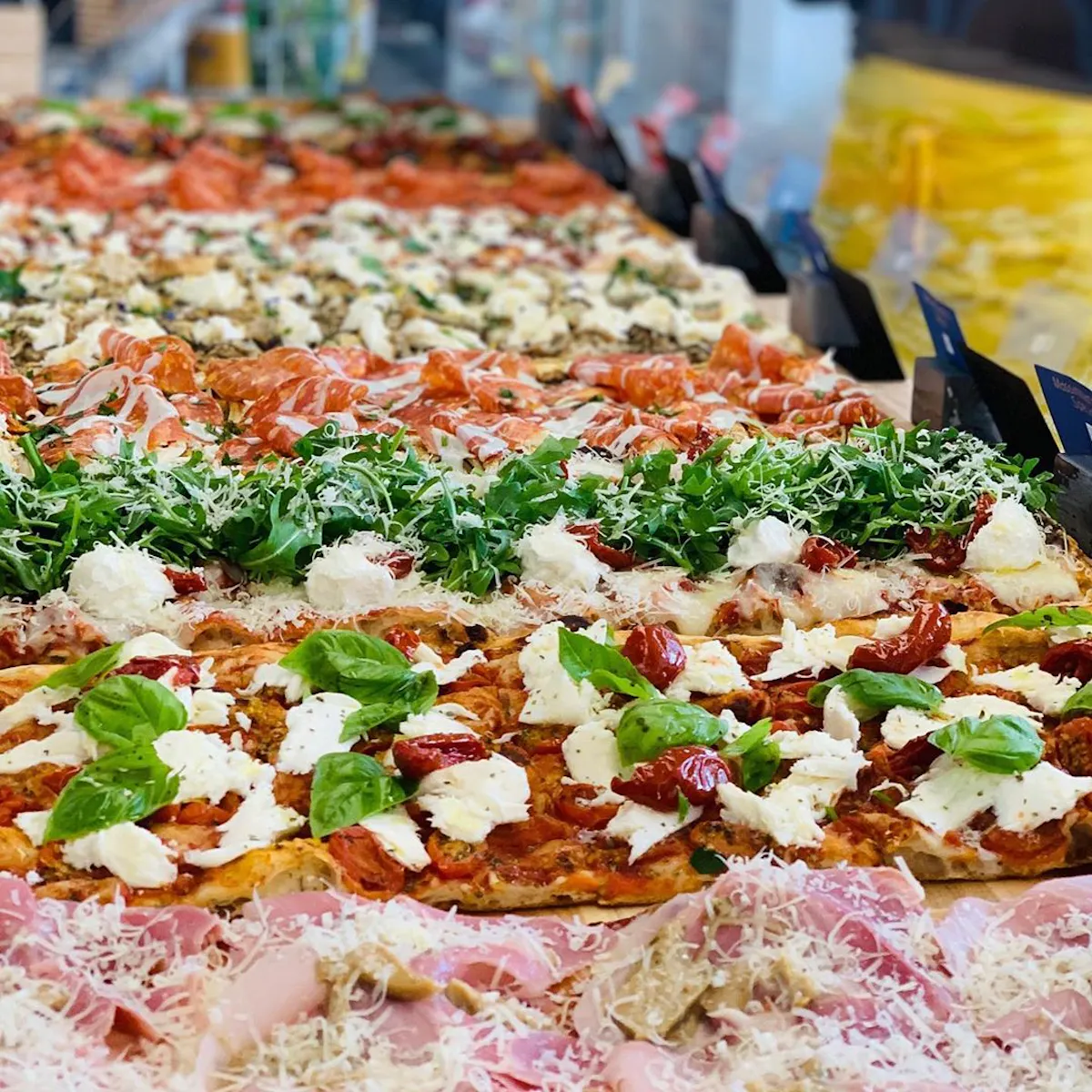 a pizza sitting on top of a table