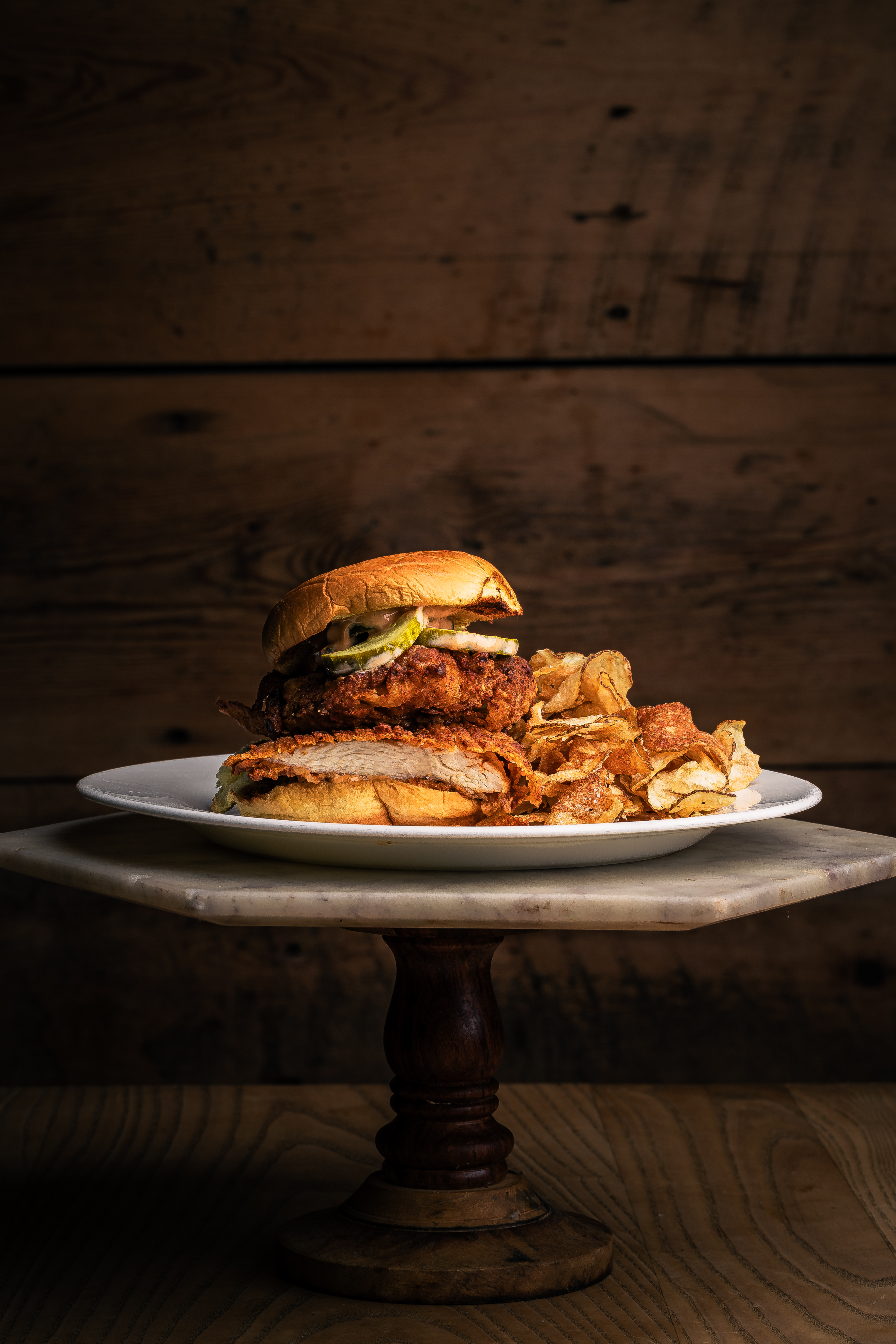 a sandwich sitting on top of a wooden table