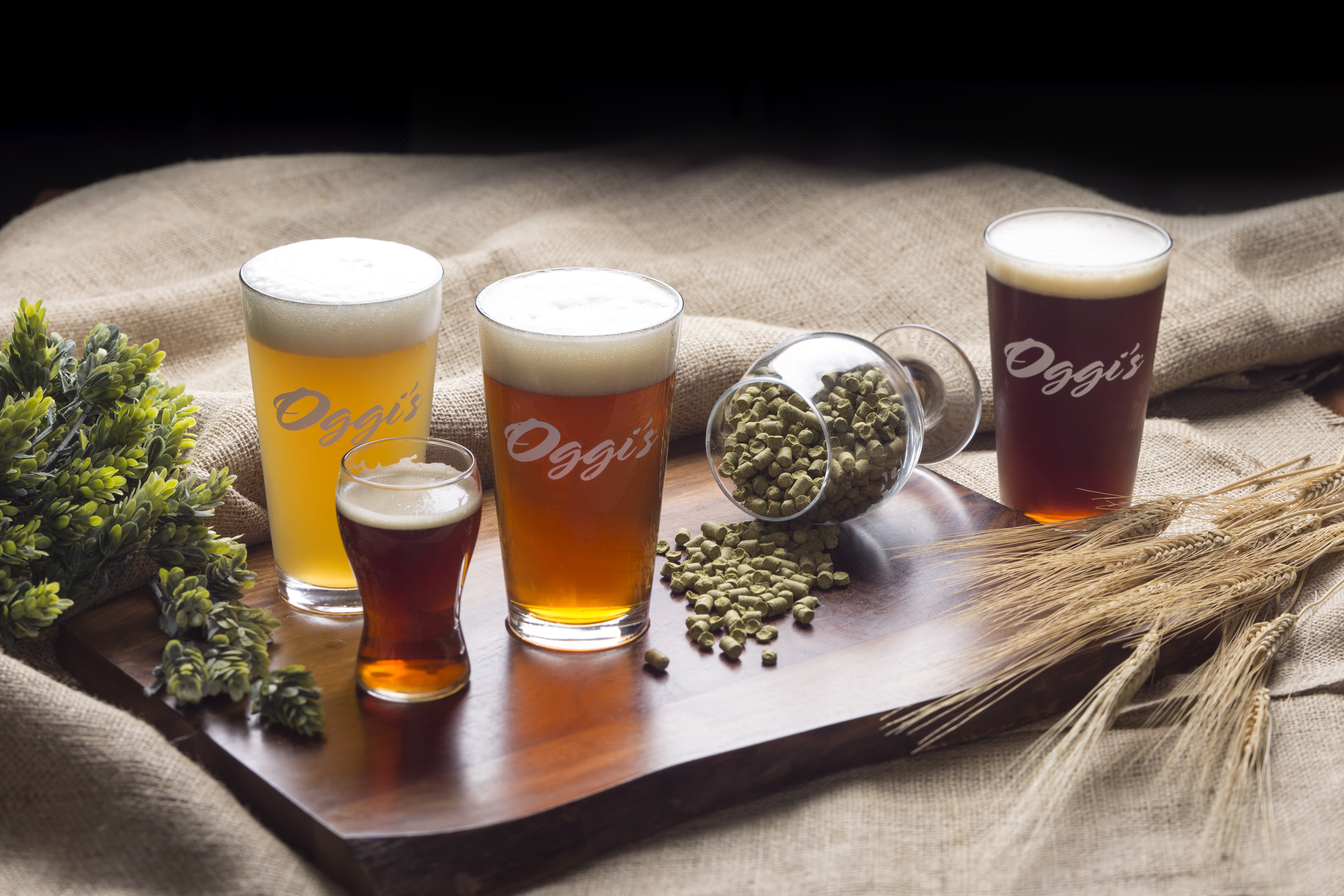 a cup of coffee and a glass of beer on a table