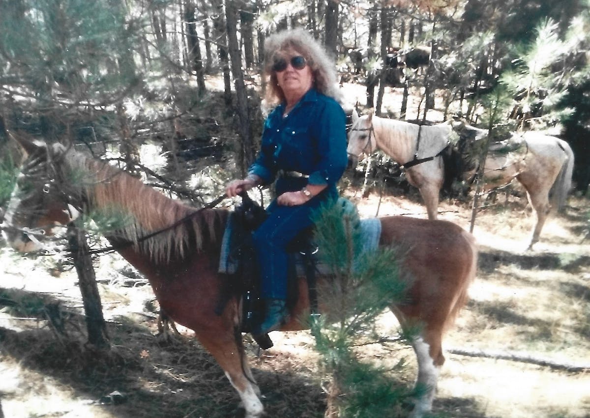 a man riding a horse