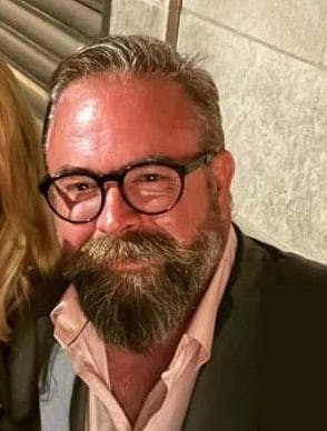 a man wearing glasses