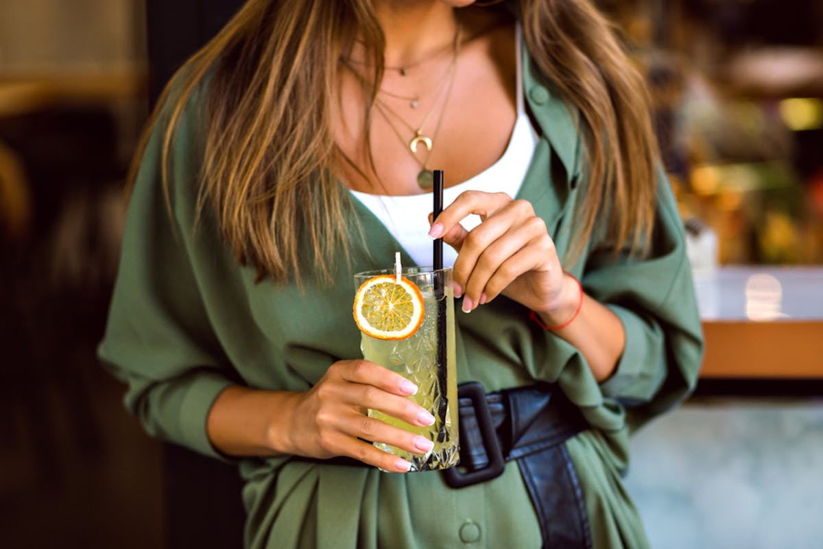 a woman holding a cell phone