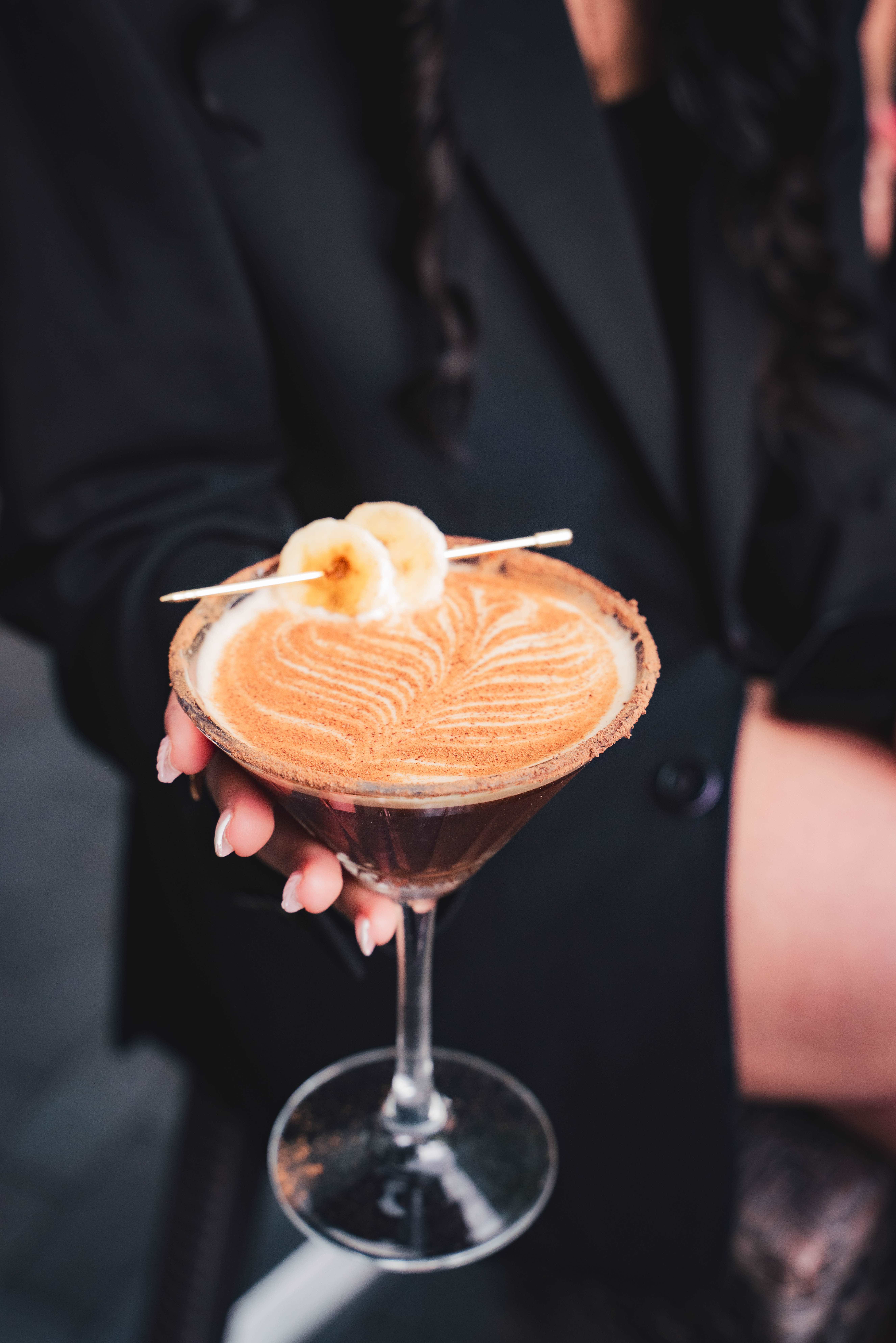 a person holding a drink