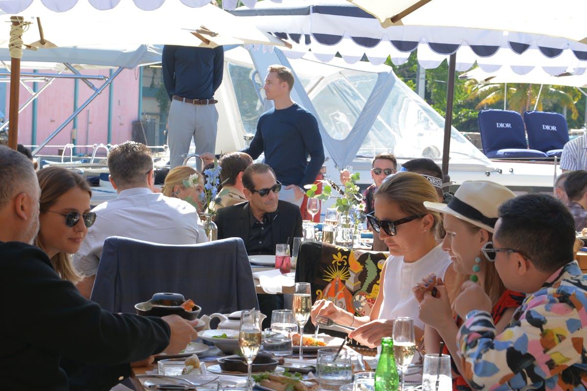 a group of people sitting at a table