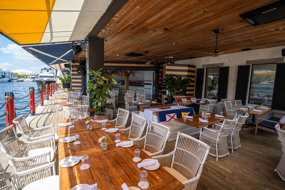 a dining room table in front of a building