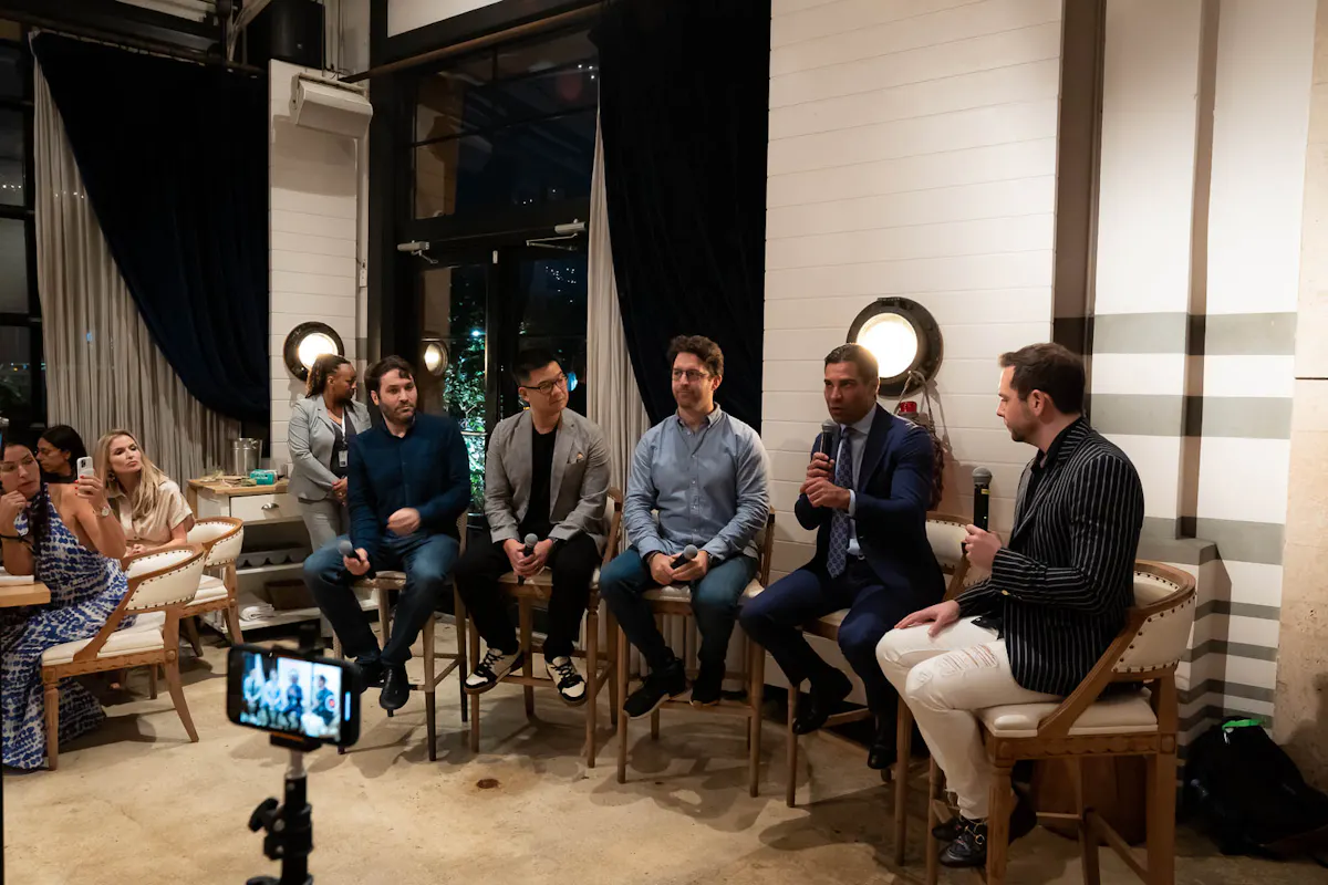 a group of people sitting at a table