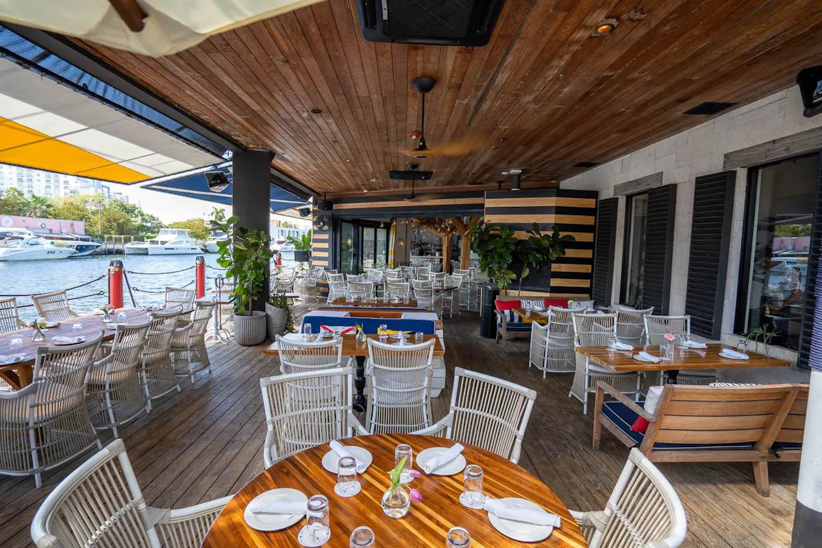 a dining room table in front of a building