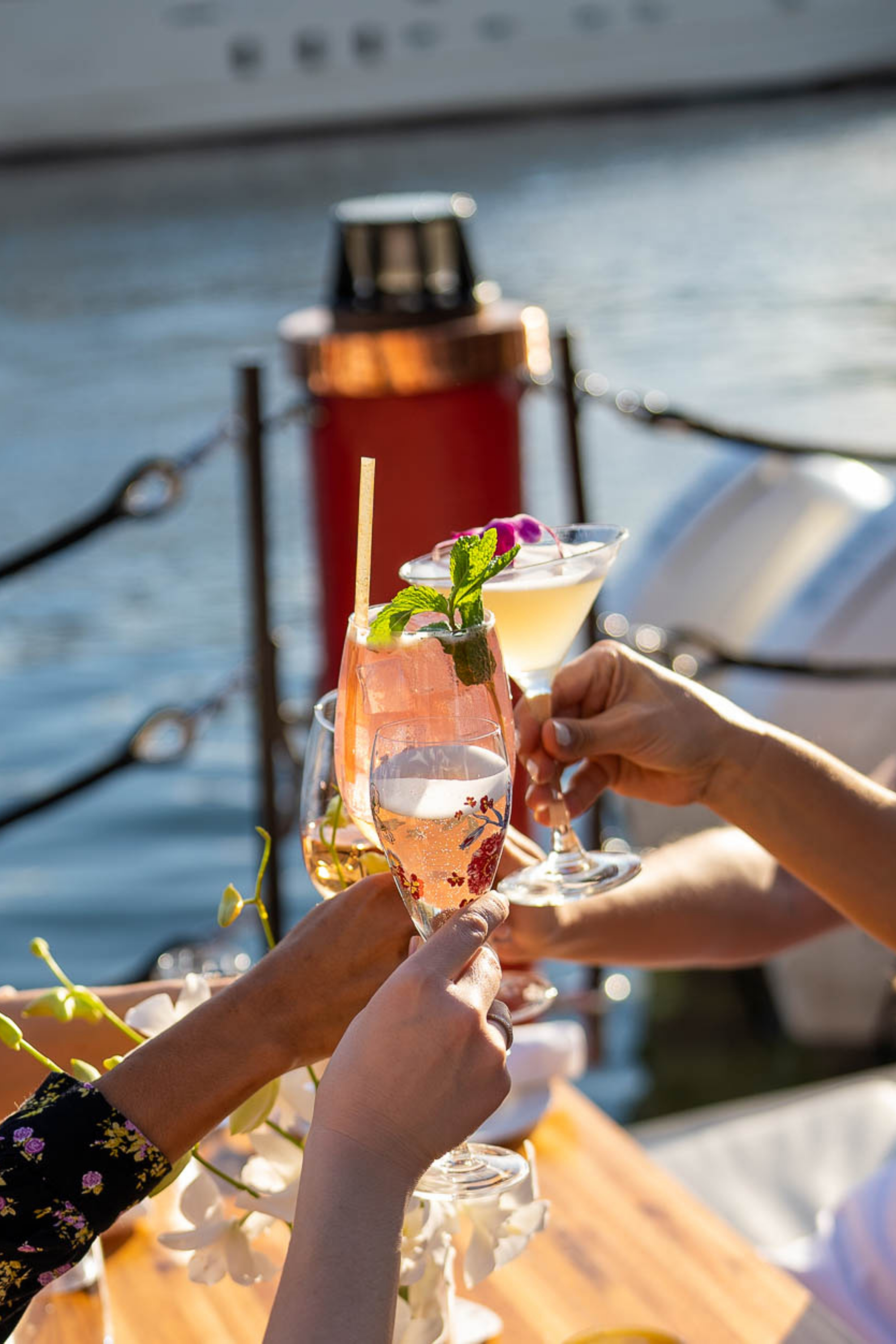 a group of people holding drinks