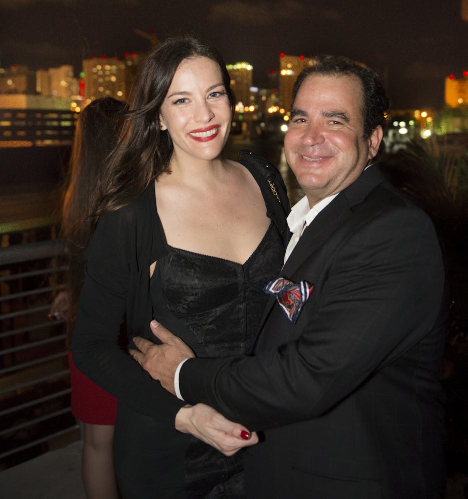 Liv Tyler and woman posing for a picture