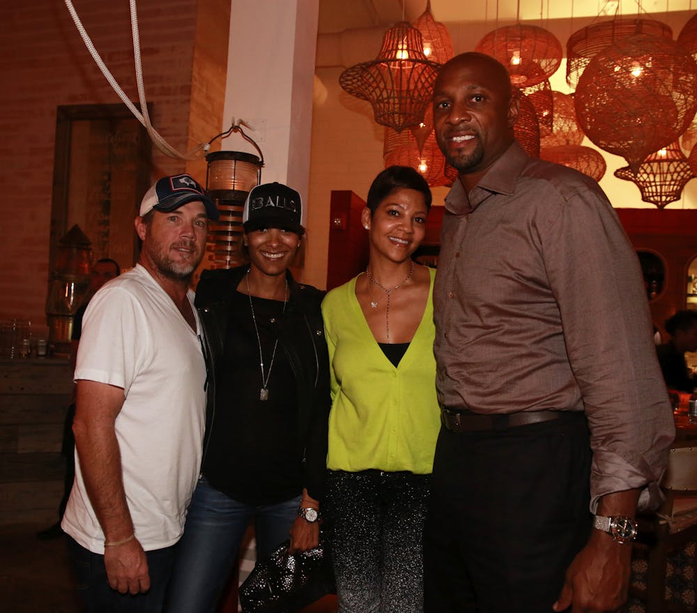 Tracy Wilson, Alonzo Mourning posing for the camera