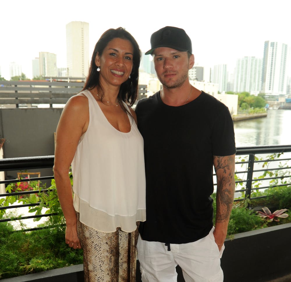 Maryam Miranda, Ryan Phillippe posing for a picture