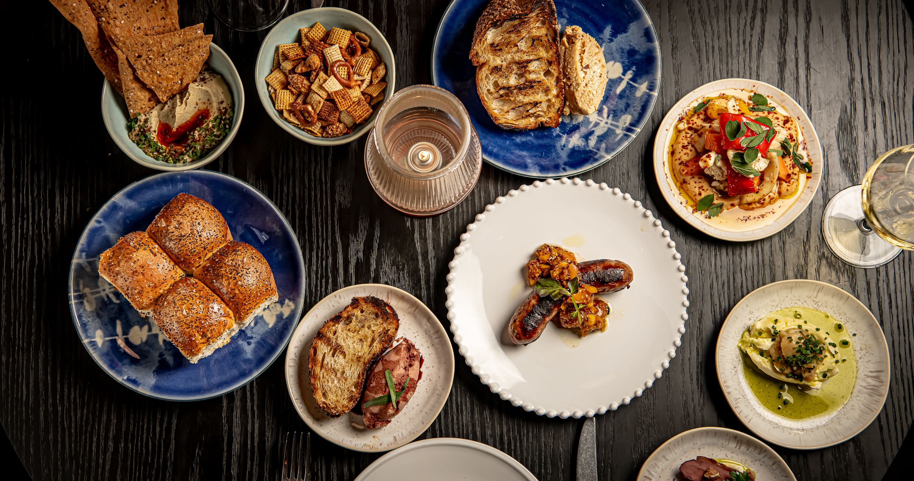 a bowl of food on a plate on a table