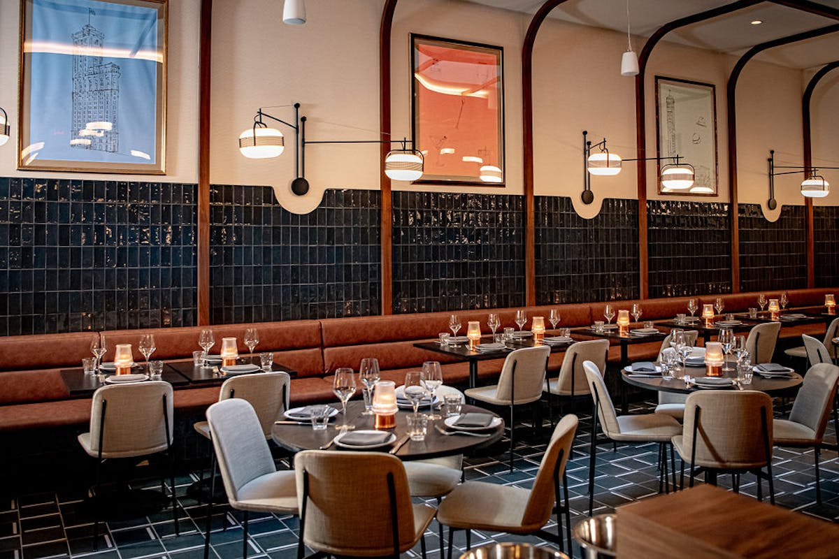 a kitchen with a table in a restaurant