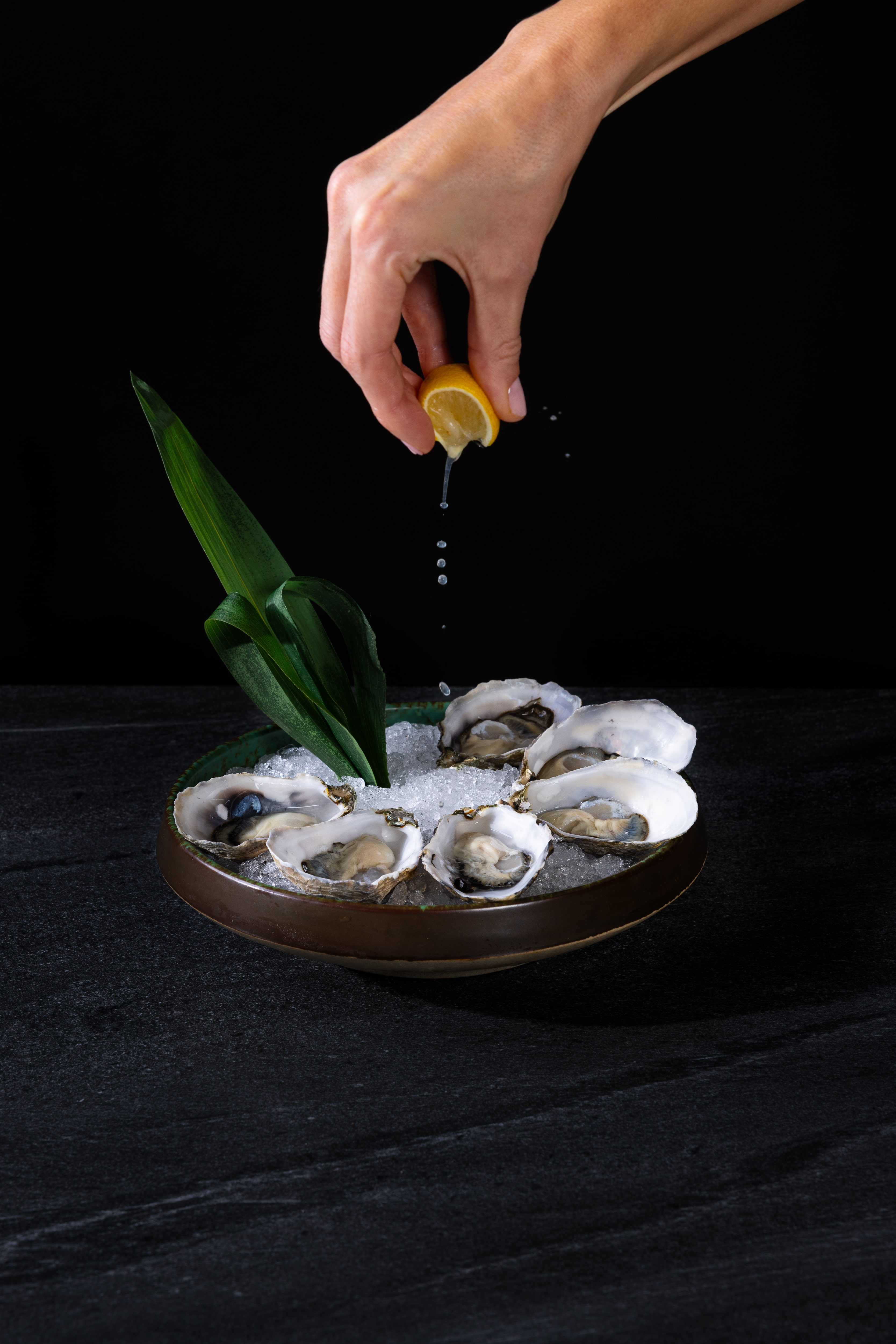 a hand holding a banana