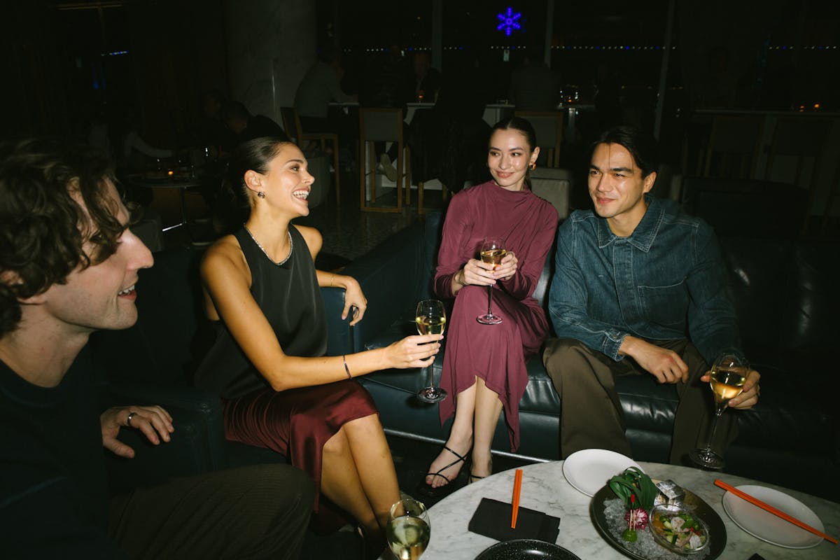 a group of people sitting at a table