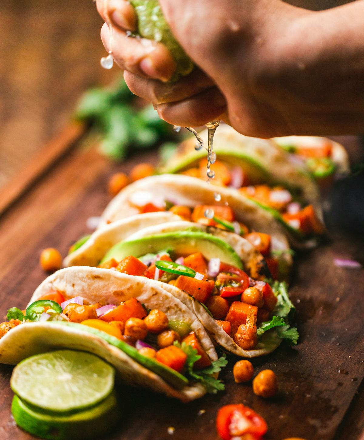a close up of a person holding food