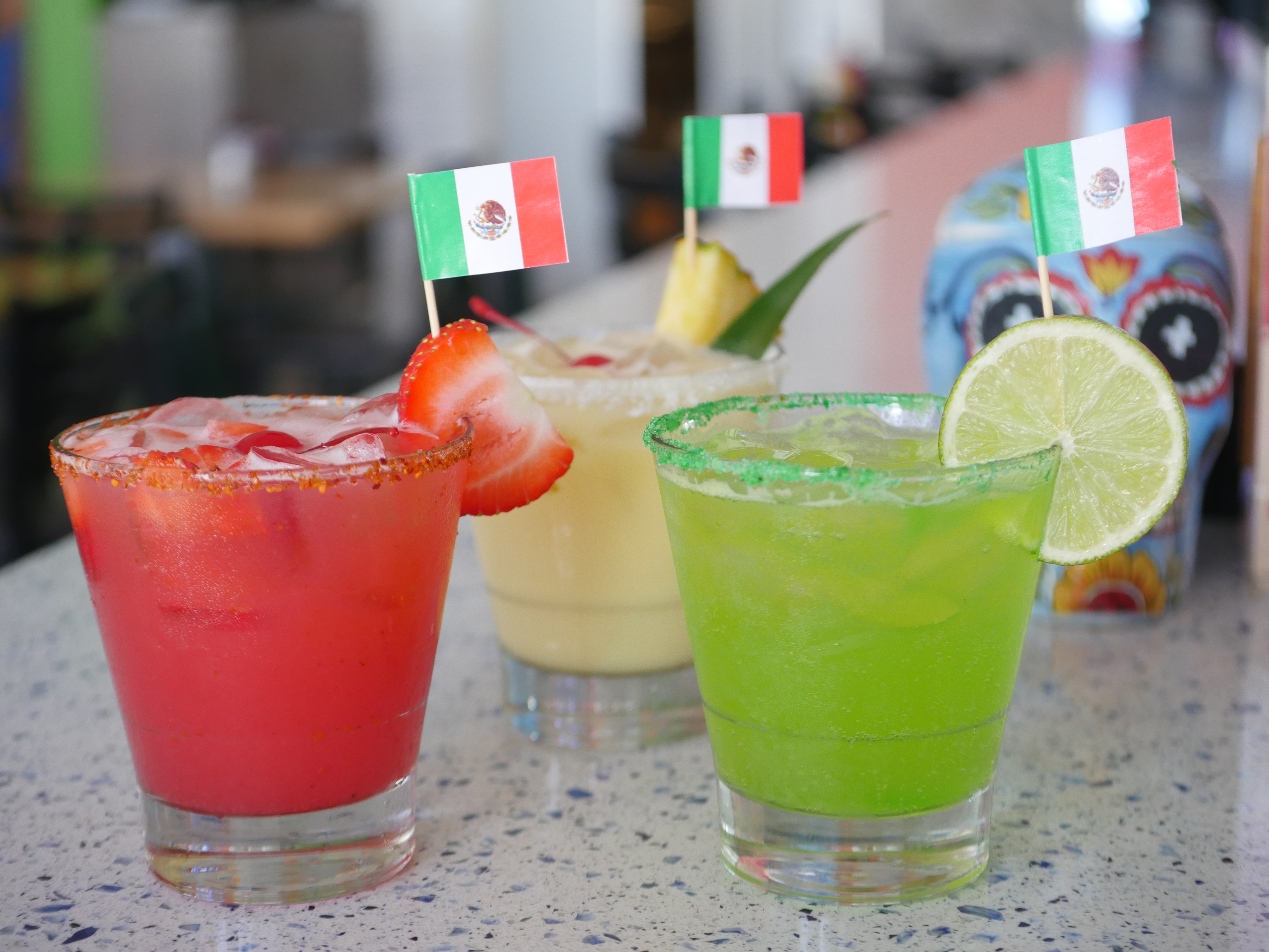 a close up of a glass of orange juice