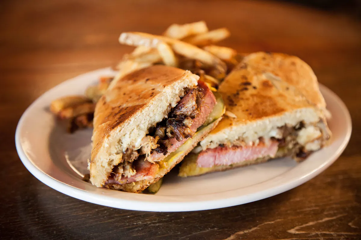 a sandwich cut in half on a plate